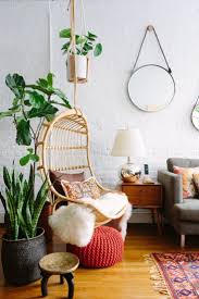 Rattan Hanging Chair In A Boho Chic Living Room Boho Chic Living Room Chic Living Room Home Decor