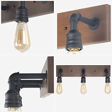 This hardwired vanity light can be mounted facing up or down and is compatible with dimmer switches and safe to use in damp locations. Lnc A03376 Bathroom Vanity Lights Farmhouse Water Pipe Wall Sconces 3 Heads Farmhouse Goals
