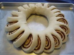 Make a well in the middle and add the milk and 4 beaten eggs, then mix for 10 minutes until the mixture forms a stretchy dough.; Cinnamon Wreath Bread Christmas Baking Favorite Recipes Christmas Food