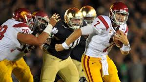 What college teams played in the first thanksgiving football game. The Best College Football Rivalries On Thanksgiving Weekend