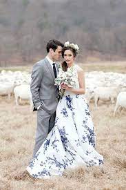 That's a floral dress, not a white dress. 15 Head Over Heels Gorgeous Floral Wedding Dresses Printed Wedding Dress Blue Wedding Dresses Colored Wedding Dresses