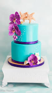 Teal And Purple Beach Wedding Cake Themed Wedding Cakes Beach Theme Wedding Cakes Vibrant Wedding Cake