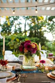 Put the season on full display with fall table centerpieces and decorating ideas. Outdoor Fall Tablescape An Autumn Harvest Table Modern Glam
