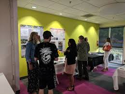 Students Demonstrate Their Websites And Portfolios For Potential Employers As The Culmination Of Their Senior Sho Interior Design School School Design Interior