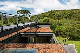 Una Arquitetos Builds House At Sao Bento Do Sapucai House Architecture House Patio Design