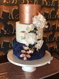 Coordinating Wedding Flowers Sugar Rose Gold Navy Blue Cake Androse Gold And Navy Blue W Navy Blue Wedding Cakes Wedding Cake Navy Wedding Cake Roses