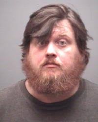 Man charged with exploiting woman