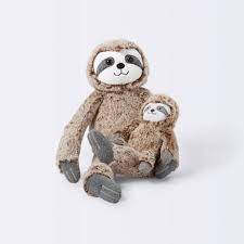 The stuffed animals in toy stores are obviously toys because they're (a) not moving, (b) usually brightly colored, and (c) mostly animals people have seen the real versions of. Plush With Rattle Sloth Cloud Island Brown Target