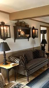 Black And White Houndstooth Sofa Sconces And Shelf Above Couch And Black And White Cream Plaid Or Houndstooth S Home Decor Styles Colonial Living Room Farm House Living Room