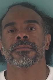 Arrest made in connection to dead body found in wooded area in Okeechobee