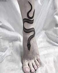 55 Snake Tattoo Ideas For Women In 2020 Tattoos Snake Tattoo Design Time Tattoos