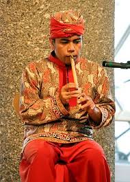 What is the process for checking in at the airport? Suling Wikipedia