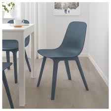 The chair is comprised of a curved back and seat attached to a base with four legs. Odger Blue Chair Ikea Odger Chair Ikea Dining Chair Dining Chairs