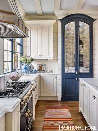 Bare wood flooring and matching cabinetry highlights add a hint of. Modern Twists On The Traditional Kitchen Home Decor Kitchen Kitchen Design Traditional House