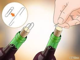 You've gotta tilt the bottle a bit on its side to make this one work: How To Open A Wine Bottle Without A Cork Opener How To Wiki 89