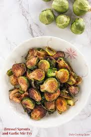 Brussels sprouts, olive oil, salt, pepper, garlic powder, bread crumbs, grated parmesan cheese. Brussels Sprouts And Garlic Stir Fry Recipe Daily Cooking Quest