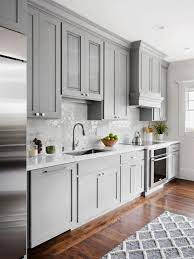 Door pulls, latches, and hinges that are made from stainless steel should be paired up with a light paint or a light stain. 20 Gray Kitchen Cabinets We Re Loving Hgtv