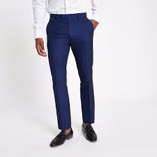 Our range of men's slim fit suit trousers include a huge selection of colours, fabrics and top uk brands, all in a sharp, tapered profile that's trendy, stylish and timeless. River Island Mens Bright Blue Slim Fit Suit Trousers The Fashionisto