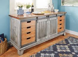 Living 80 miles from the hardware store requires some creativity ;) you can still use steel ones if you wish, but here's a quick diy from scrap wood. Barn Door Cabinet Woodworking Project Woodsmith Plans