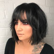 Framing your face and adding shape! Layered Modern French Bob With Face Framing Fringe Bangs And Messy Just A Bend Texture On Black Hair The Latest Hairstyles For Men And Women 2020 Hairstyleology