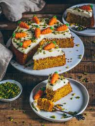 carrot cake with a creamy frosting vegan carrot cakes food recipes