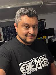 Why is Uta's Wings is black?is she a lunarian?and i just notice he has  white hair too!like lunarian do! Its just my Theory.