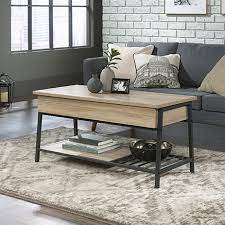 Amazon has the sauder craftsman oak coffee table w/ hidden storage for a low $98 free shipping. North Avenue Lift Top Coffee Table Charter Oak 424931 Sauder Sauder Woodworking