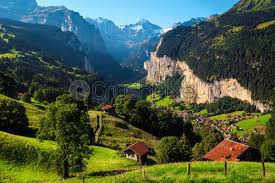 Large windows framed a picturesque pond, boarded by tall pines. Picturesque Green Fields And Snowy Mountains Wengen Resort Lauterbrunnen Switzerland Stock Photo Crushpixel