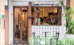 Make Me Mango A Cute Yellow Themed Cafe Near Tha Tien Wat Pho Is All About You Guess It Mango Step Insi Bangkok Restaurant Coffee Shop Design Cafe Design