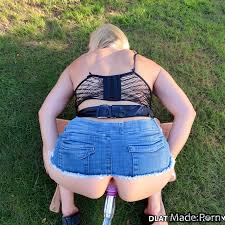 Slutty partially nude denim thong pic with fishnet masturbation - AI created