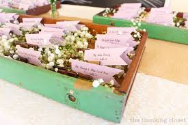 Diy wood card display and holder. Diy Clothespin Place Card Holders For A Rustic Vintage Wedding The Thinking Closet