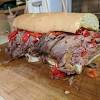 Top with lettuce leaf, roast beef, tomato slices, onion, and remaining bread slice. 1