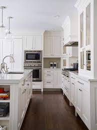 With the contrast between the different types of material in the cabinets and countertops, any kitchen can be transformed with a deep wooden color in the floors. 75 Beautiful Dark Wood Floor Kitchen Pictures Ideas June 2021 Houzz