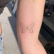 Single Needle Butterfly Tattoo On The Left Inner Arm Butterfly Tattoo Left Arm Tattoos Pattern Tattoo