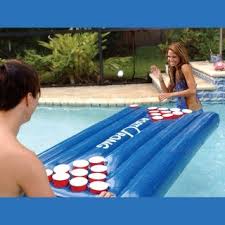 Floating Beer Pong With A Patented Gust O Wind This Game Could Get Really Difficult Pool Beer Pong Beer Pong Pool Floats