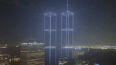 2,977 drones light up New York harbor in stunning 9/11 tribute: Watch the Twin Towers reappear - The Times of India