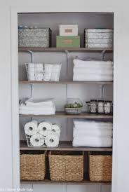 This compact closet is designed to hold linens. Bathroom Linen Closet Reveal Our Home Made Easy