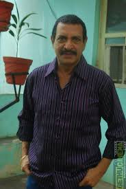 He has acted in 500 films. Actor Nizhalgal Ravi Gallery Gethu Cinema Shiva Photos Actors Gallery