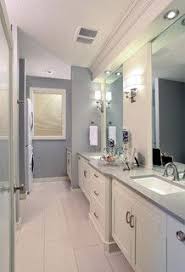 The brass mirror really stands out against the gray wallpaper while the two brown nickel and glass wall sconces tie it all together. 87 Best Houzz Bathroom Ideas Bathroom Design Bathrooms Remodel Houzz Bathroom