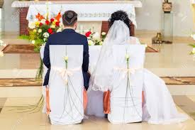 There are different ways a traditional christian wedding ceremony can be officiated. Wedding Ceremony Bride And Groom During The Wedding Sit In The Stock Photo Picture And Royalty Free Image Image 85010209