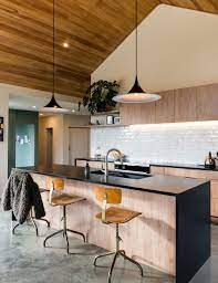 This Striking Queenstown House Makes The Most Of Its Remarkable Views Concrete Kitchen Floor Kitchen Flooring House