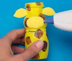 Son olarak da kafanın üst kısmına ponponlarla birleşmesi için elyaf yapıştıralım. Plastik Siseden Yapilan 4 Tane Hayvan Seklinde Kumbaralar Nazarca Com Kumbara Sise Plastik Sise