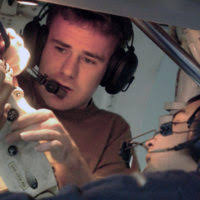 Warrior without the uniform, Tom Higgins, US Air Force (USAF) Engineering  and Technical Services and USAF SENIOR AIRMAN (SRA) Colin George, Crew  CHIEF 31st Maintenance Squadron (MXS), discover a bolt missing from