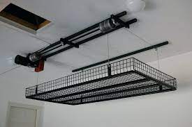 I think overhead garage storage is the answer to my clutter problem. Garage Lift System Storage Novocom Top