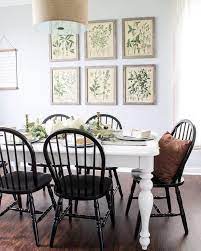 Crafted of hardwood solids, engineered wood, and veneers, the table features turned legs. White Farm Table With Black Windsor Chairs Farmhouse Dining Room Table Farmhouse Dining Rooms Decor Farmhouse Dining Room