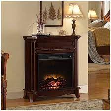 It is more compact approximately. Petite Foyer Electric Fireplace Big Lots Furniture Fireplace Apartment Decor