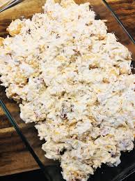 Spoon into the casserole dish, making it as evenly distributed as possible. Chicken Bacon Ranch Tater Tot Casserole Cooks Well With Others