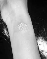 Black And White Ink Tattoos White Inked Rose Tattoo On The Wrist Www Otziapp Com White Tattoo Small White Tattoos White Ink Tattoo