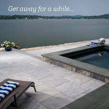 A Beautiful Pool Deck With A Beautiful Pool Consider Using Belgard Porcelain Pavers For Your Next Project Pool Pavers Outdoor Patio Diy Patio Pavers