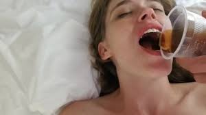 Drinking soda from each others mouths